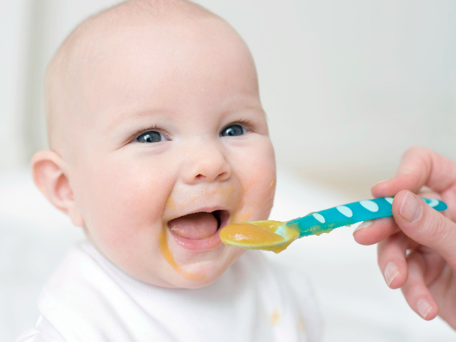 When do babies start eating baby food?